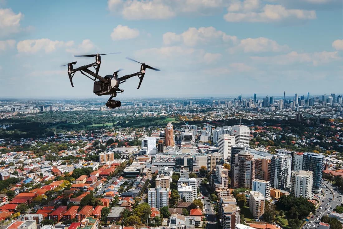 Survey UAV in flight capturing aerial data over a Sydney suburb